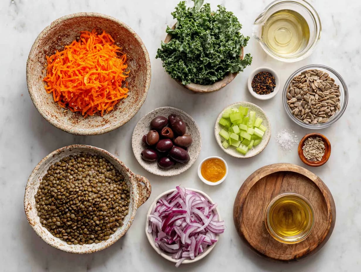 Top-down photo of Moroccan Lentil Carrot Salad ingredients on marble